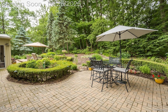 3788 Crestlake Dr, Bloomfield Hills, MI 48304 - view of patio featuring outdoor dining space and view of scattered trees