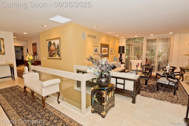 3788 Crestlake Dr, Bloomfield Hills, MI 48304 - living room with recessed lighting, light tile patterned floors, and a skylight