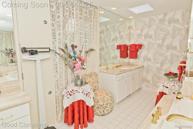 3788 Crestlake Dr, Bloomfield Hills, MI 48304 - full bath with wallpapered walls, tile patterned flooring, vanity, recessed lighting, and a bath