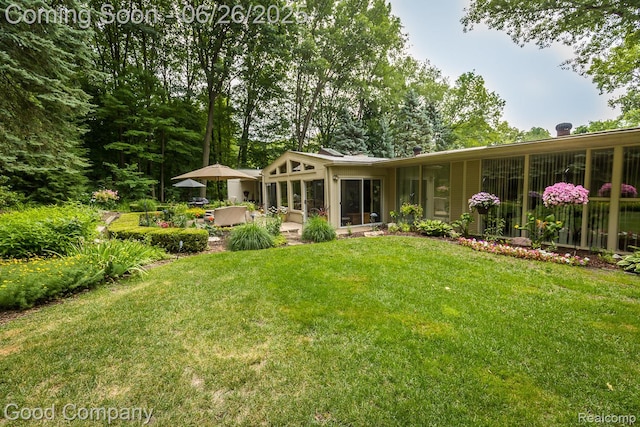 3788 Crestlake Dr, Bloomfield Hills, MI 48304 - back of property with a lawn