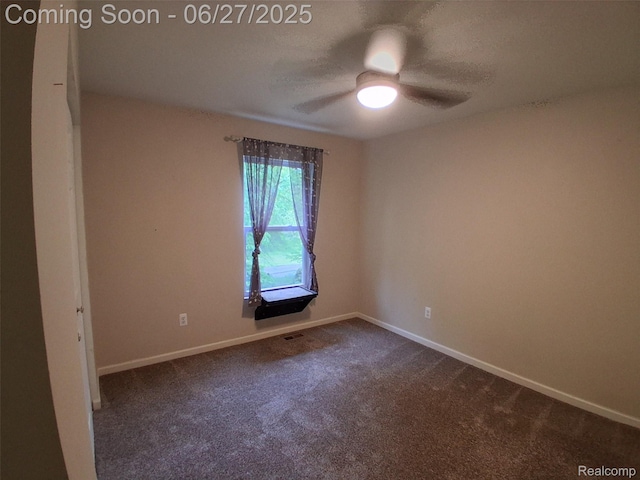 155 Cascade Ln, Waterford, MI 48327 - unfurnished room featuring dark carpet, a ceiling fan, and a textured ceiling