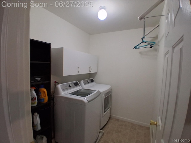 155 Cascade Ln, Waterford, MI 48327 - washroom featuring separate washer and dryer and cabinet space