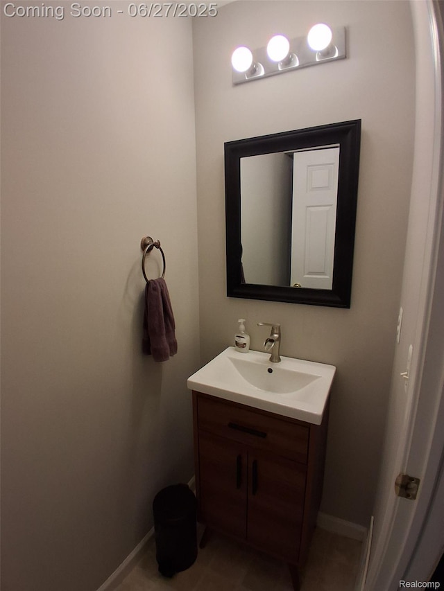 155 Cascade Ln, Waterford, MI 48327 - bathroom with vanity and baseboards