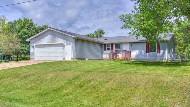123 Carlysle Dr, Brooklyn, MI 49230 - ranch-style house with a garage, concrete driveway, and a front lawn
