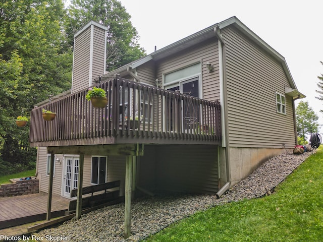 17474 Connor Cir, Bailey, MI 49303 - back of house with a deck and a chimney