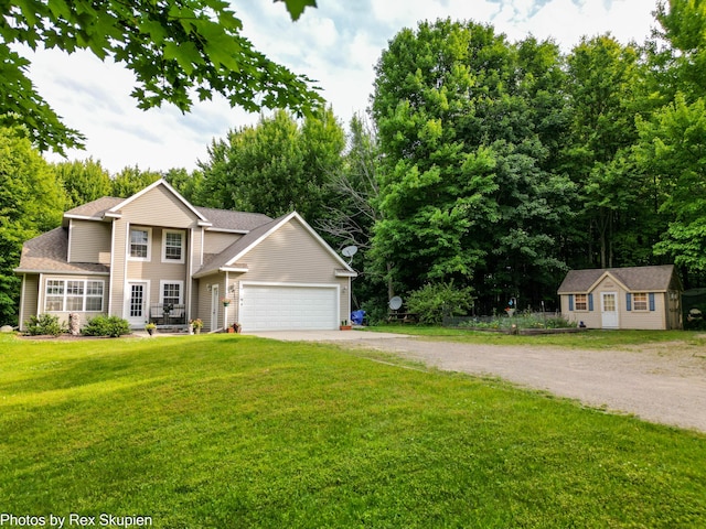 17474 Connor Cir, Bailey, MI 49303 - view of front of house featuring dirt driveway, an attached garage, a front yard, an outbuilding, and a shingled roof