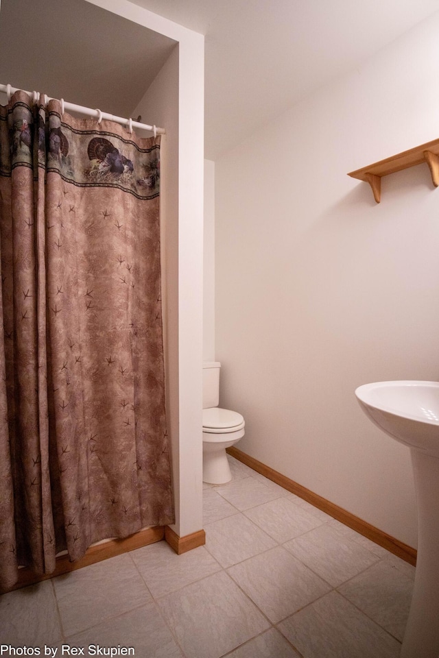 17474 Connor Cir, Bailey, MI 49303 - bathroom featuring tile patterned flooring and a shower with shower curtain