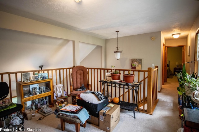 17474 Connor Cir, Bailey, MI 49303 - sitting room with carpet and an upstairs landing