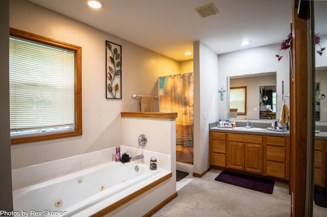 17474 Connor Cir, Bailey, MI 49303 - bathroom featuring a stall shower, vanity, a whirlpool tub, and recessed lighting