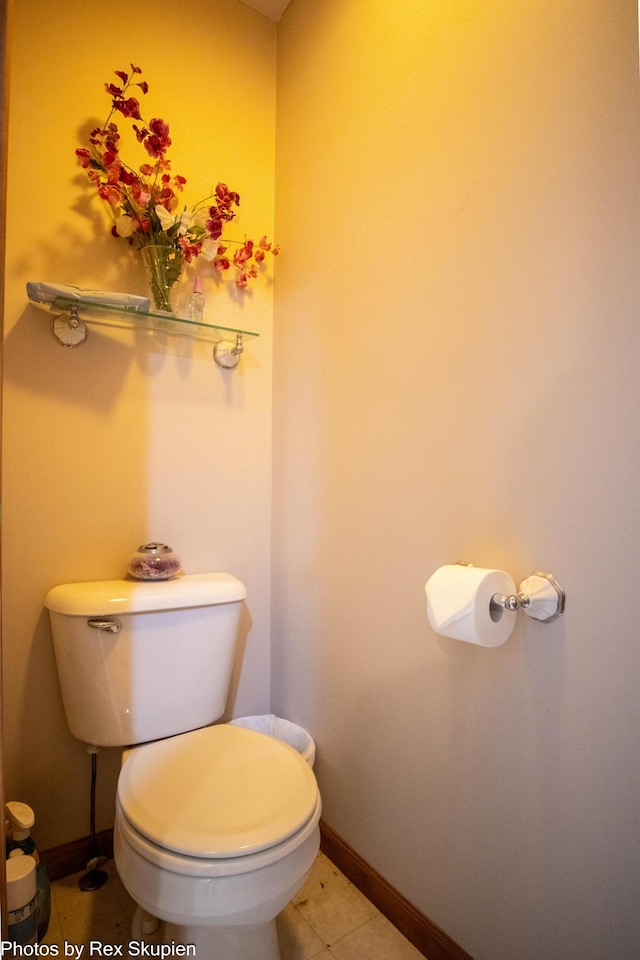 17474 Connor Cir, Bailey, MI 49303 - half bath featuring toilet and tile patterned flooring