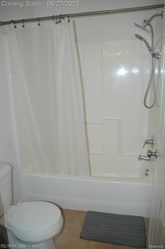 785 Pathway Dr, Howell, MI 48843 - bathroom with shower / bathtub combination with curtain and tile patterned flooring