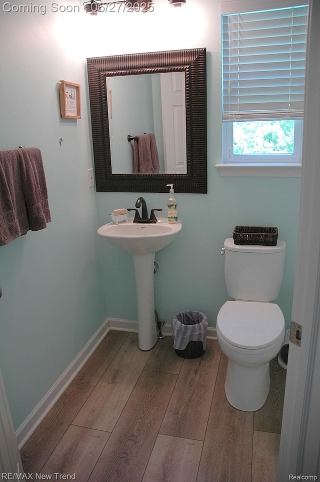 785 Pathway Dr, Howell, MI 48843 - bathroom featuring wood finished floors