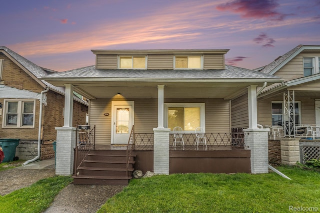 701 Cleophus Pkwy, Lincoln Park, MI 48146 - bungalow-style home featuring covered porch and roof with shingles