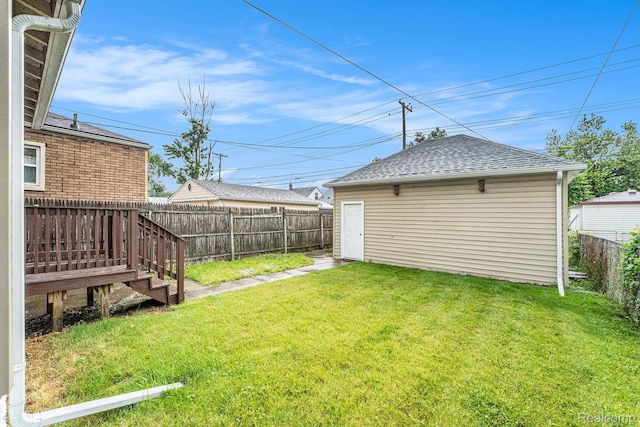 701 Cleophus Pkwy, Lincoln Park, MI 48146 - fenced backyard with an outdoor structure