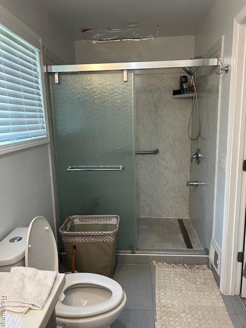 20796 Gill Rd, Farmington Hills, MI 48335 - bathroom with toilet and a shower stall