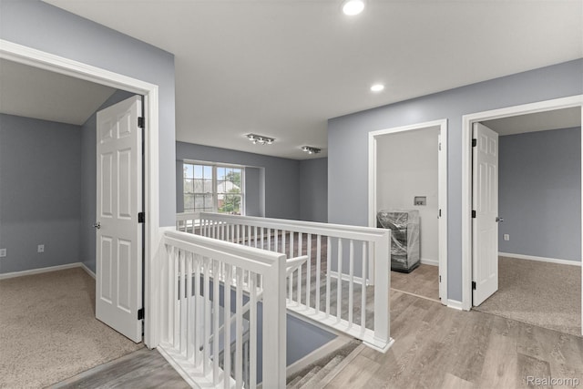 10913 Edlie Cir, Dearborn Heights, MI 48214 - hall with an upstairs landing, wood finished floors, and recessed lighting