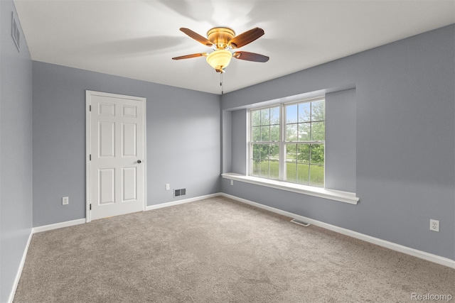 10913 Edlie Cir, Dearborn Heights, MI 48214 - carpeted empty room featuring a ceiling fan and baseboards
