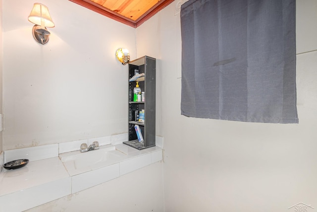 735 W Stewart St, Owosso, MI 48867 - bathroom featuring ornamental molding
