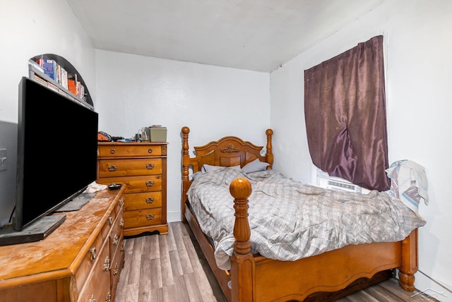 735 W Stewart St, Owosso, MI 48867 - bedroom with wood finished floors