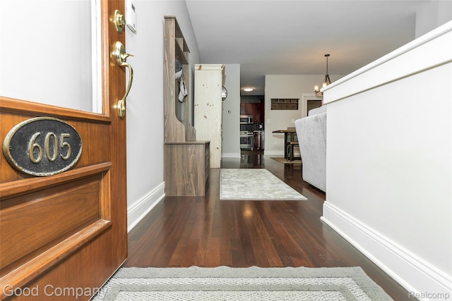 605 S Troy St, Royal Oak, MI 48067 - entryway featuring wood finished floors and a chandelier