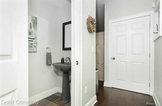 605 S Troy St, Royal Oak, MI 48067 - bathroom featuring baseboards and wood finished floors
