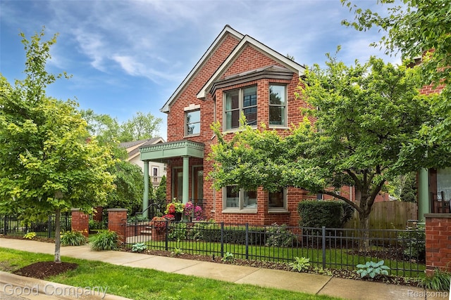 605 S Troy St, Royal Oak, MI 48067 - victorian home featuring brick siding and a fenced front yard