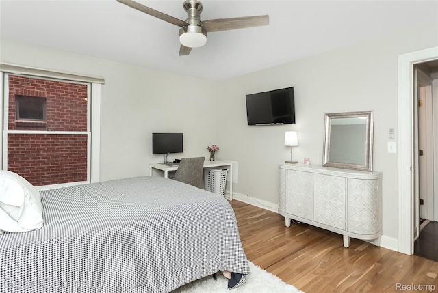 605 S Troy St, Royal Oak, MI 48067 - bedroom featuring wood finished floors and a ceiling fan