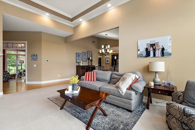 7870 Mooring Ct, Hudsonville, MI 49426 - living area featuring carpet flooring, a chandelier, ornamental molding, and recessed lighting