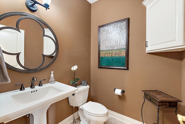 7870 Mooring Ct, Hudsonville, MI 49426 - half bathroom featuring baseboards and toilet