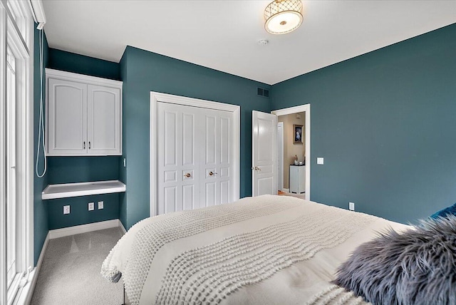 7870 Mooring Ct, Hudsonville, MI 49426 - bedroom with a closet and carpet floors