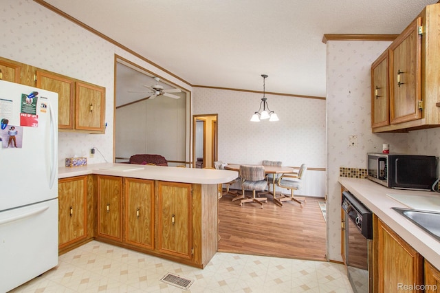 2900 Hyde Park, Bay City, MI 48706 - kitchen featuring freestanding refrigerator, crown molding, dishwasher, wallpapered walls, and a peninsula