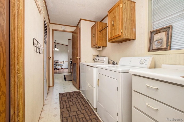 2900 Hyde Park, Bay City, MI 48706 - washroom with cabinet space, light flooring, washer and dryer, and a textured ceiling