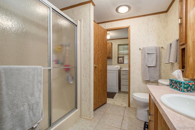 2900 Hyde Park, Bay City, MI 48706 - bathroom with washer / dryer, ornamental molding, a shower with shower door, vanity, and wallpapered walls