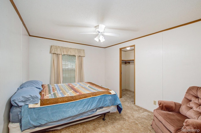 2900 Hyde Park, Bay City, MI 48706 - bedroom with ornamental molding, carpet flooring, a ceiling fan, a walk in closet, and a closet