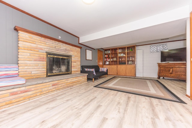 1169 Wilbur, Pinckney, MI 48169 - unfurnished living room with a fireplace and wood finished floors