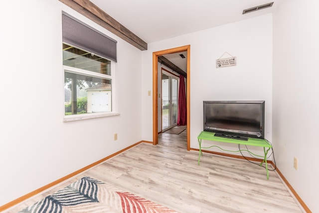 1169 Wilbur, Pinckney, MI 48169 - unfurnished room with healthy amount of natural light and wood finished floors
