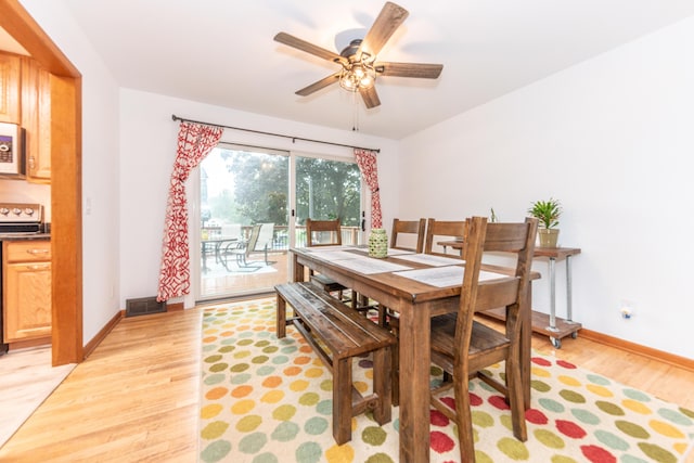 1169 Wilbur, Pinckney, MI 48169 - dining room with light wood finished floors and a ceiling fan