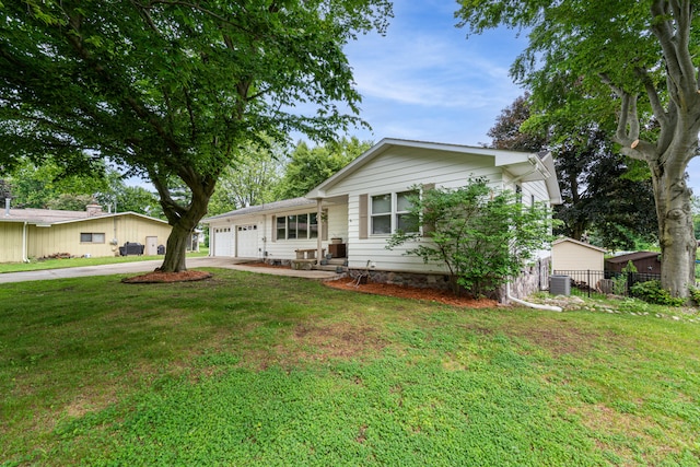 1169 Wilbur, Pinckney, MI 48169 - ranch-style home with driveway and an attached garage