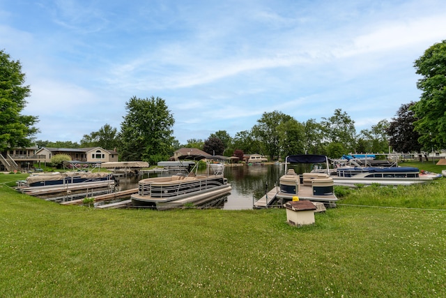 1169 Wilbur, Pinckney, MI 48169 - dock featuring a lawn