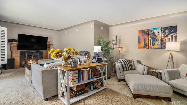 22011 Englehardt St, Saint Clair Shores, MI 48080 - living area featuring carpet flooring and a fireplace with flush hearth