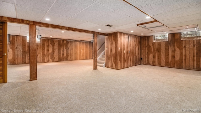 22011 Englehardt St, Saint Clair Shores, MI 48080 - below grade area with wood walls, stairs, carpet flooring, and recessed lighting
