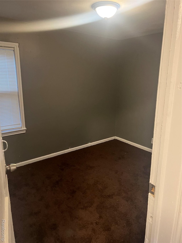 19500 Rutherford St, Detroit, MI 48235 - empty room with dark colored carpet