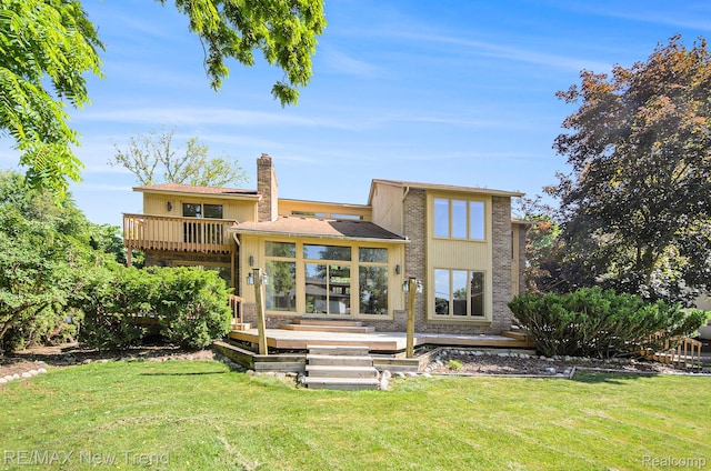 3234 Pine Lake Rd, West Bloomfield, MI 48324 - back of house featuring a yard, a wooden deck, and a chimney