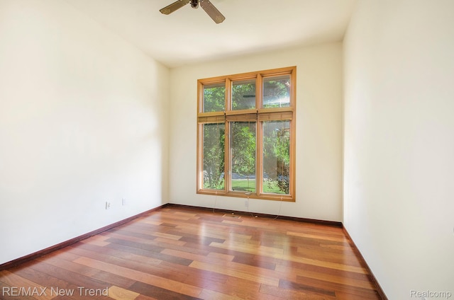 3234 Pine Lake Rd, West Bloomfield, MI 48324 - spare room featuring wood finished floors and a ceiling fan