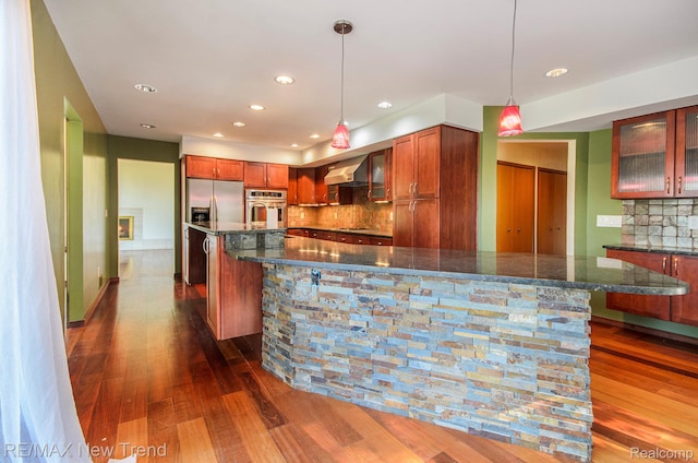 3234 Pine Lake Rd, West Bloomfield, MI 48324 - kitchen with stainless steel appliances, a spacious island, dark wood-type flooring, decorative backsplash, and glass insert cabinets