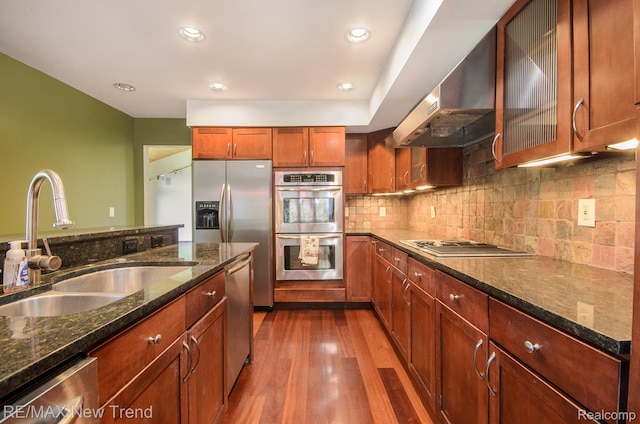 3234 Pine Lake Rd, West Bloomfield, MI 48324 - kitchen with stainless steel appliances, range hood, dark wood-style flooring, tasteful backsplash, and glass insert cabinets