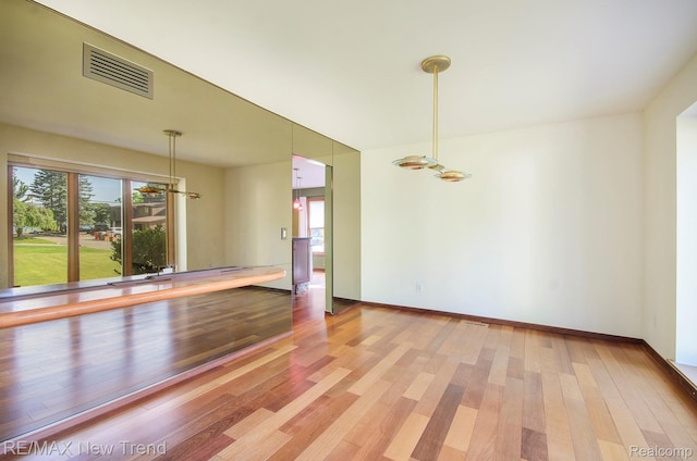 3234 Pine Lake Rd, West Bloomfield, MI 48324 - empty room featuring light wood finished floors and baseboards