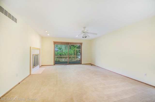 3234 Pine Lake Rd, West Bloomfield, MI 48324 - unfurnished living room with a ceiling fan, light carpet, and recessed lighting