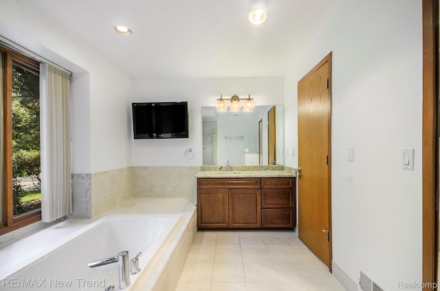 3234 Pine Lake Rd, West Bloomfield, MI 48324 - bathroom featuring vanity, a garden tub, tile patterned flooring, and recessed lighting
