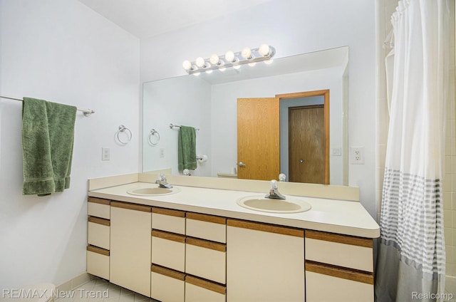 3234 Pine Lake Rd, West Bloomfield, MI 48324 - bathroom featuring double vanity